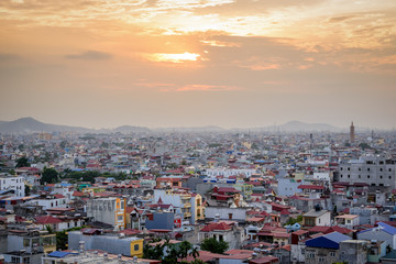 Awakening fast changing city, northern Vietnam, a developing city and country, fusion of local tradition and modern buildings