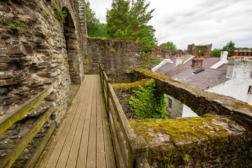 Old wooden walkway on medieval town walls in Conwy, Wales