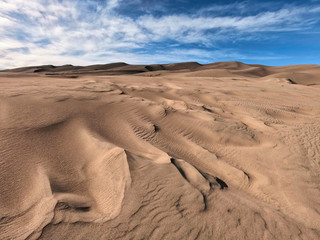 Fototapeta na wymiar Dry and Desolate Landscape of Desert Sand at Great Sand Dunes National Park in Colorado