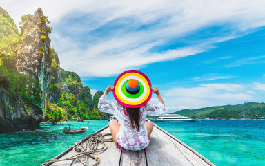 Lifestyle traveler woman in beach wear joy fun on boat Phi Phi island Krabi, Attraction landmark...