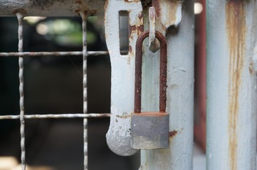 A rust oxidation on a key of a iron door.