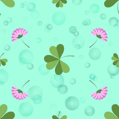 Pink clover flowers and green leaves seamless pattern on blue background.
