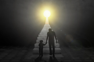 Silhouette of father and son holding hands. Community key support and helping children concept with of a group of extended adult people offering help or therapy to a child in need. education symbol.