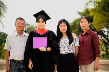 Graduation ceremony. Parents and family congratulate the student, who finish their studies at the university.