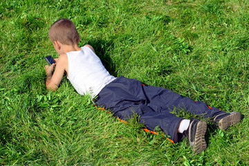 Boy On The Grass