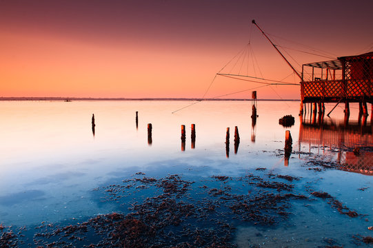 Pialassa della Baiona, Marina Romea, Ravenna, Emilia Romagna, Italy, Europe. Fishing hut in the salt lagoon.