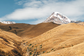 Colorful mountain landscape view with vivid blue sky in europe.