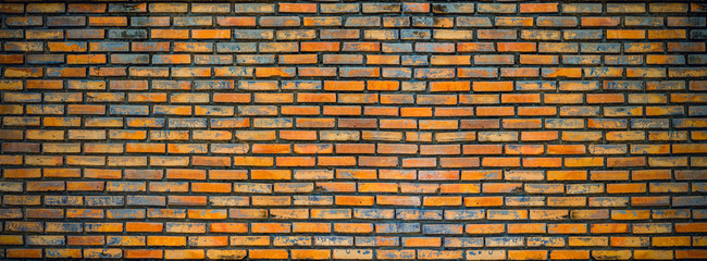Old red bricks wall texture and background.