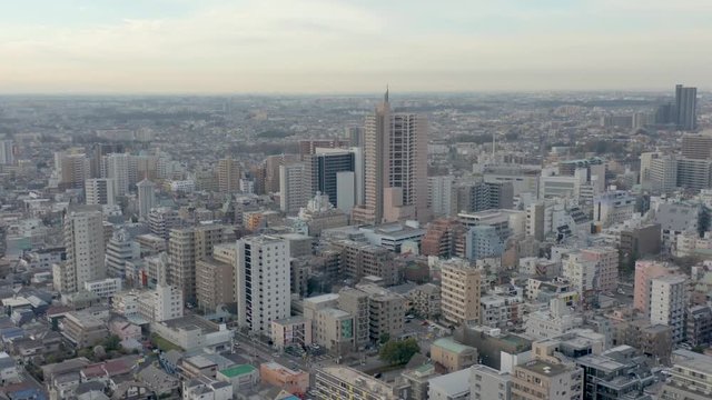 Tokyo, Machida. Aerial pan over city in morning. Japan