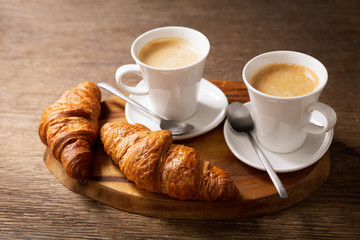cups of coffee and croissants