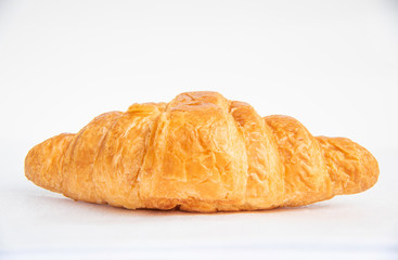 Fresh croissants isolated on white background.
