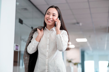 Fototapeta premium Asian young woman is woking in office