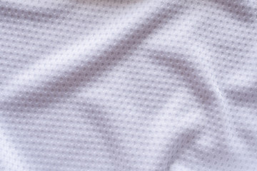 White fabric sport clothing football jersey with air mesh texture background