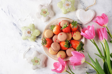 Sweets, strawberries and tulips