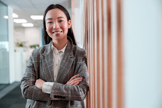 Asian Young Woman Is Woking In Office