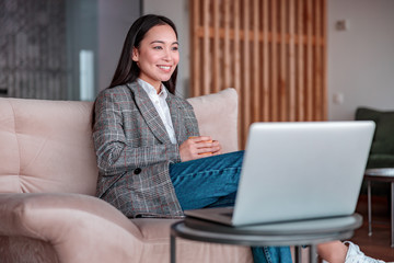 Asian woman is working in office