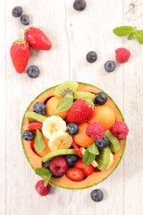fruit salad with melon, strawberry, banana, kiwi and blueberry