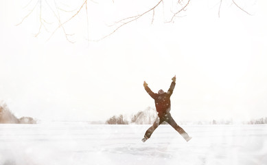A man on a walk. Winter landscape. Tourist in winter journey.