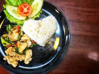 Thai Food , Ka Phao Pla Muek ,rice with chicken and vegetables