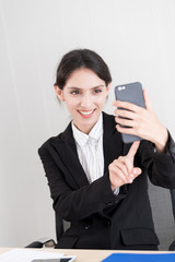 A businesswoman has working with concentrate and happiness.