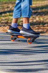 A girl is playing a roller board