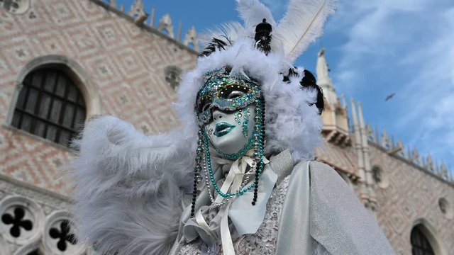 February 2020 Venice Carnival, Italy - Venice - carnival masks are photographed with tourists in Piazza San Marco