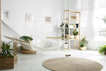 Fotobehang Boho Comfortable hammock in stylish room. Interior design  © New Africa