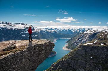 admire, adventure, aerial, beautiful, blue, cliff, climbing, dangerous, destination, explore, extreme, famous, fjord, happiness, high, hiking, hill, lake, landscape, lifestyle, looking, mountain, natu