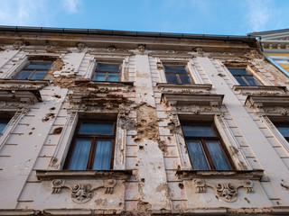 Building damaged with bullet holes, Otacac, Croatia