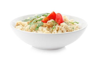 Delicious risotto with chicken isolated on white
