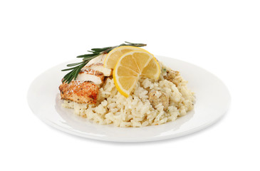Delicious chicken risotto with lemon slices isolated on white