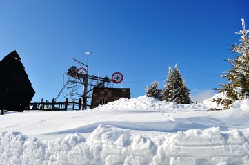 Skiers on the track in the snow
