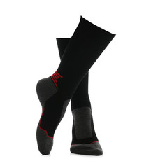 Woman wearing thermal socks on white background, closeup of legs. Winter sport clothes