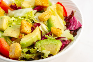fresh avocado salad, with tomato and croutons