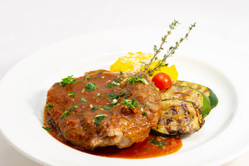 Lamb stew with Mediterranean sauce and vegetables