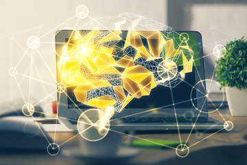 Multi exposure of work table with computer and brain hologram. Brainstorm concept.