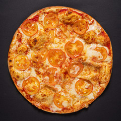 tasty pizza on the black background