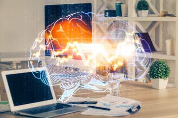 Double exposure of work table with computer and brain sketch hologram. Brainstorming concept.