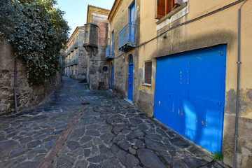 Acciaroli, Italy, 02/15/2020. A narrow street between the old houses of a village in southern Italy