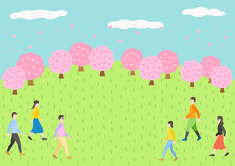 桜並木と原っぱ　花見をする人々