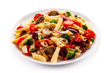 Penne with meat and vegetables on white background