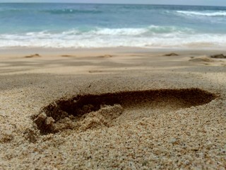 Photo of human footprint (footmark) on the tropical beach