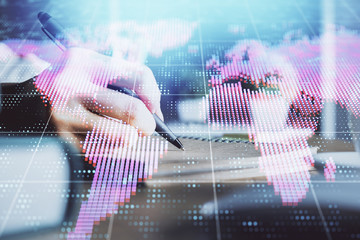 International business hud over woman's hands writing background. Concept of hard work. Double...