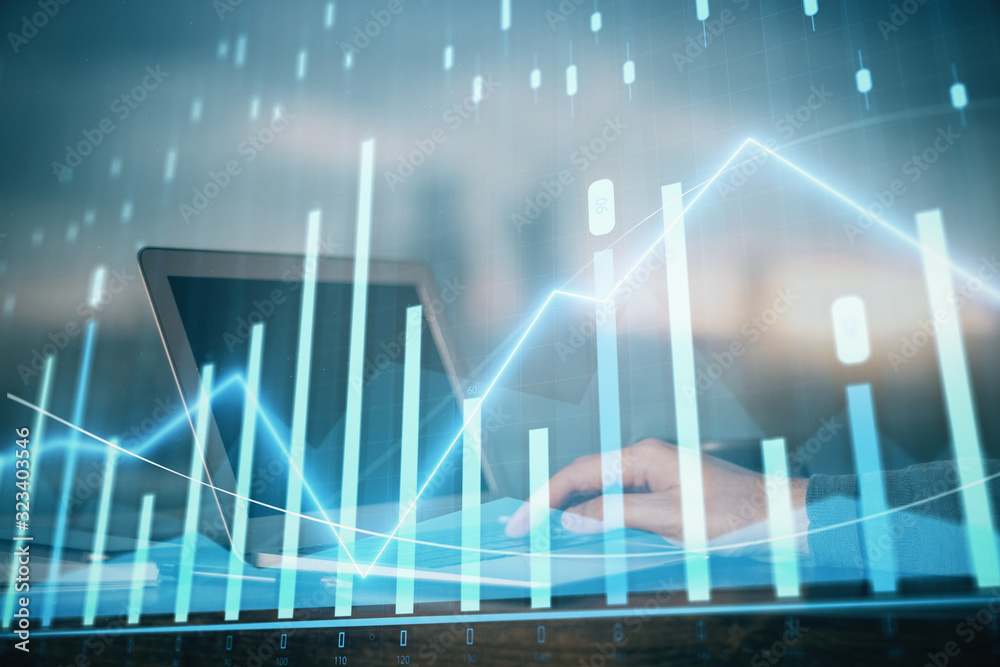 Poster double exposure of stock market graph with man working on laptop on background. concept of financial