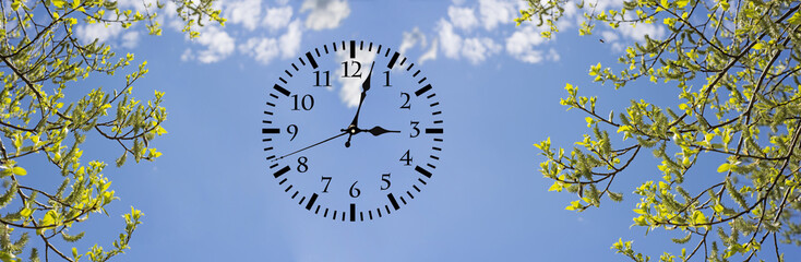 Daylight Saving Time (DST). Blue sky with white clouds and clock. Turn time forward (+1h).