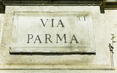 Via Parma street sign on wall in Rome