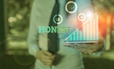 Writing note showing Honest. Business concept for telling the truth or able to be trusted and not...