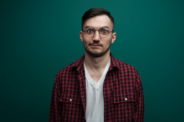 Fototapeta premium Portrait of a funny young interested man