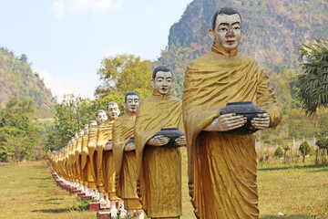 Row Buddhist monk statues in Myanmar