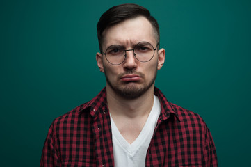 Obraz premium Portrait of a funny young interested man
